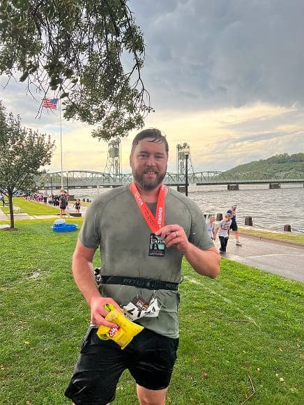 David sitting on a chair